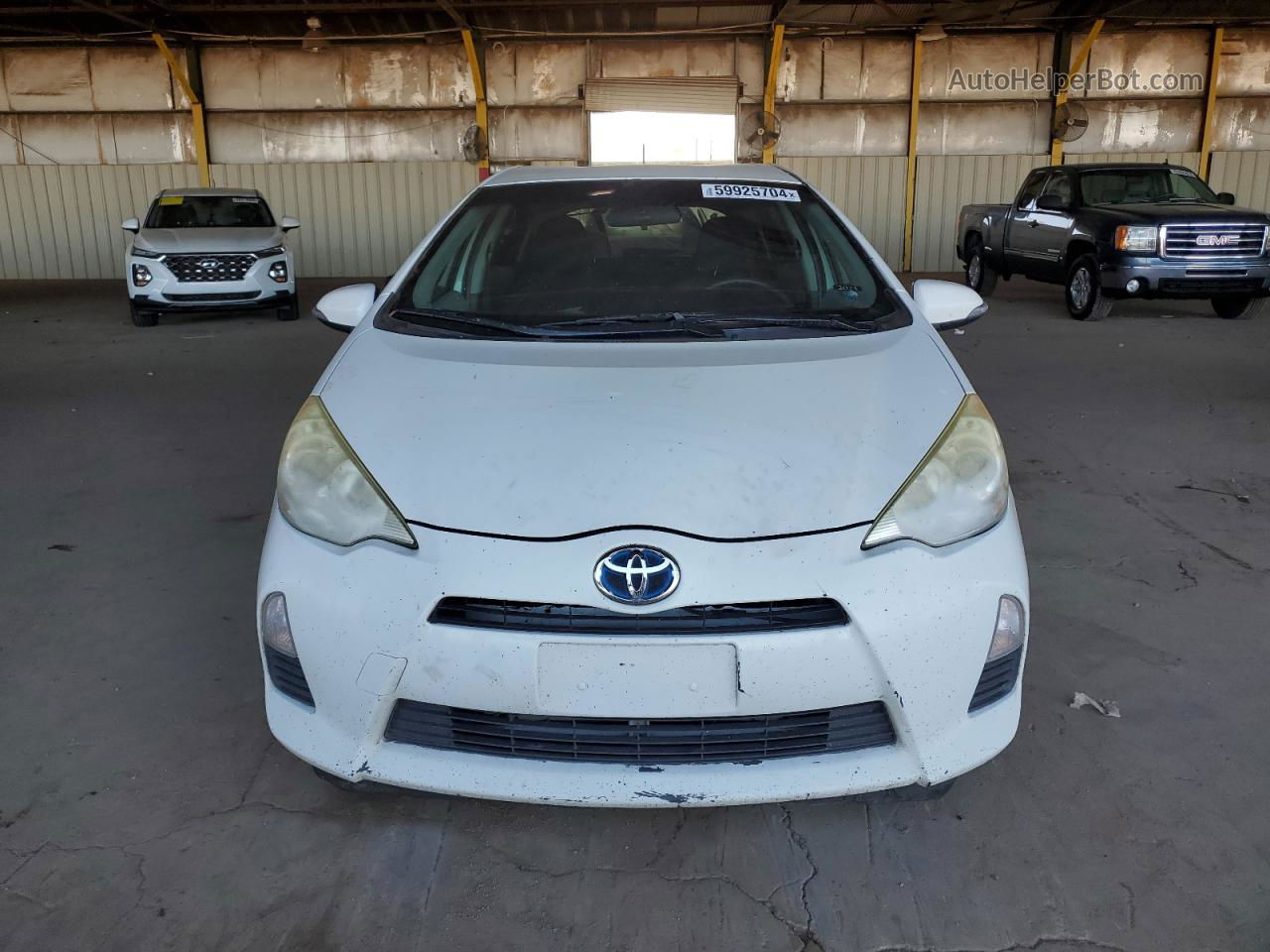 2012 Toyota Prius C  Белый vin: JTDKDTB3XC1002262