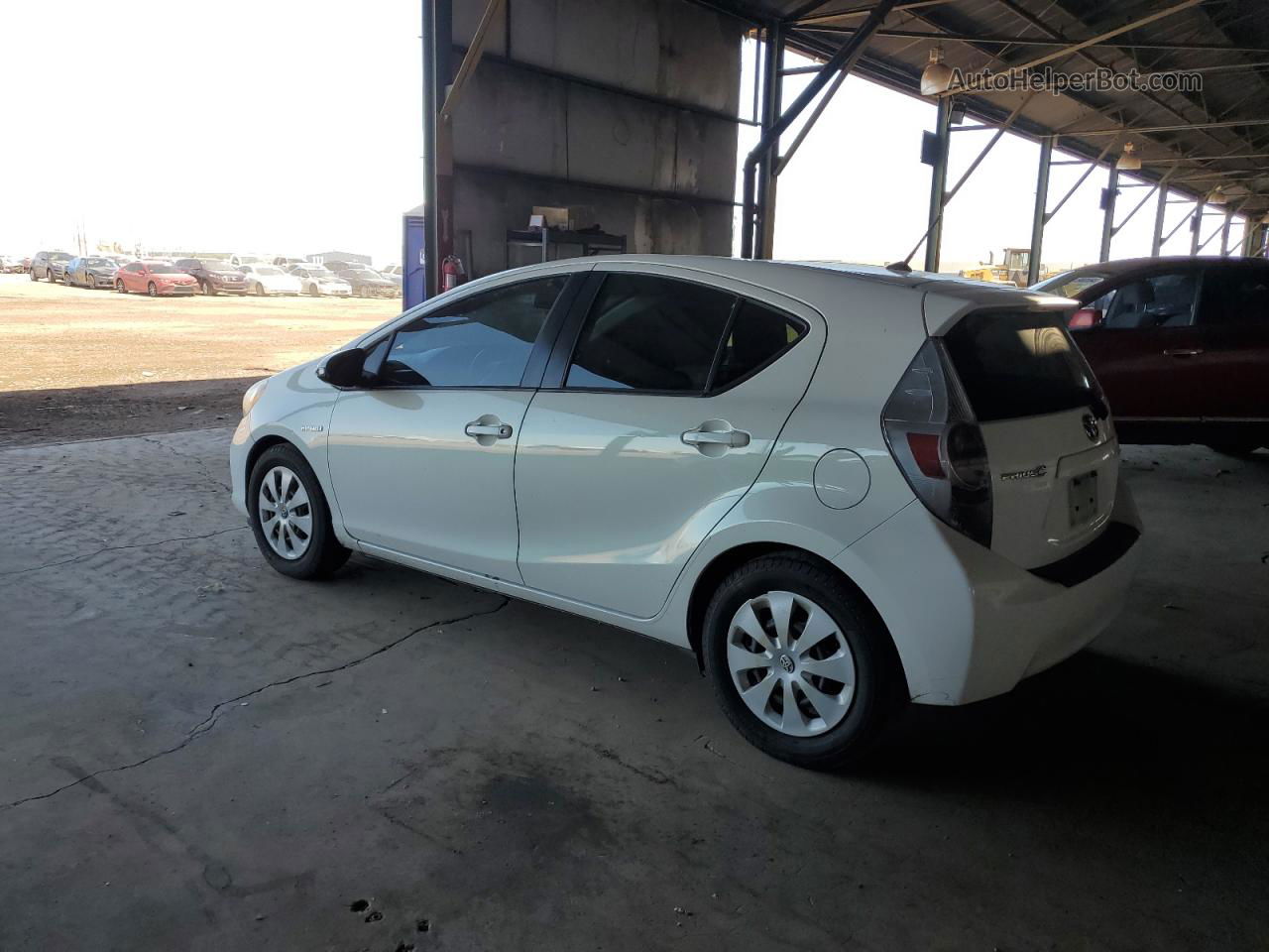 2012 Toyota Prius C  White vin: JTDKDTB3XC1002262