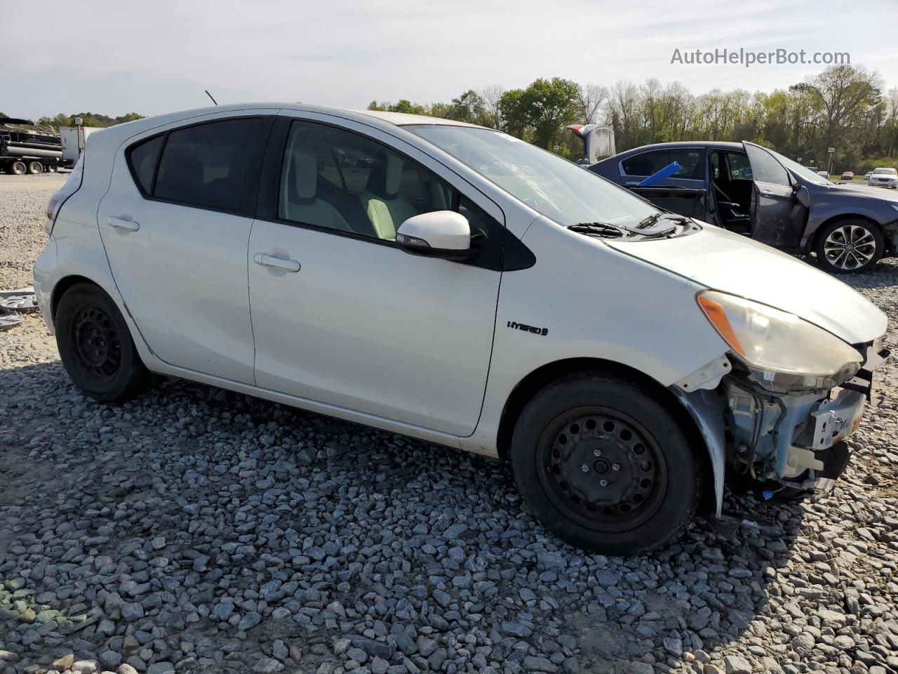 2012 Toyota Prius C  White vin: JTDKDTB3XC1523756