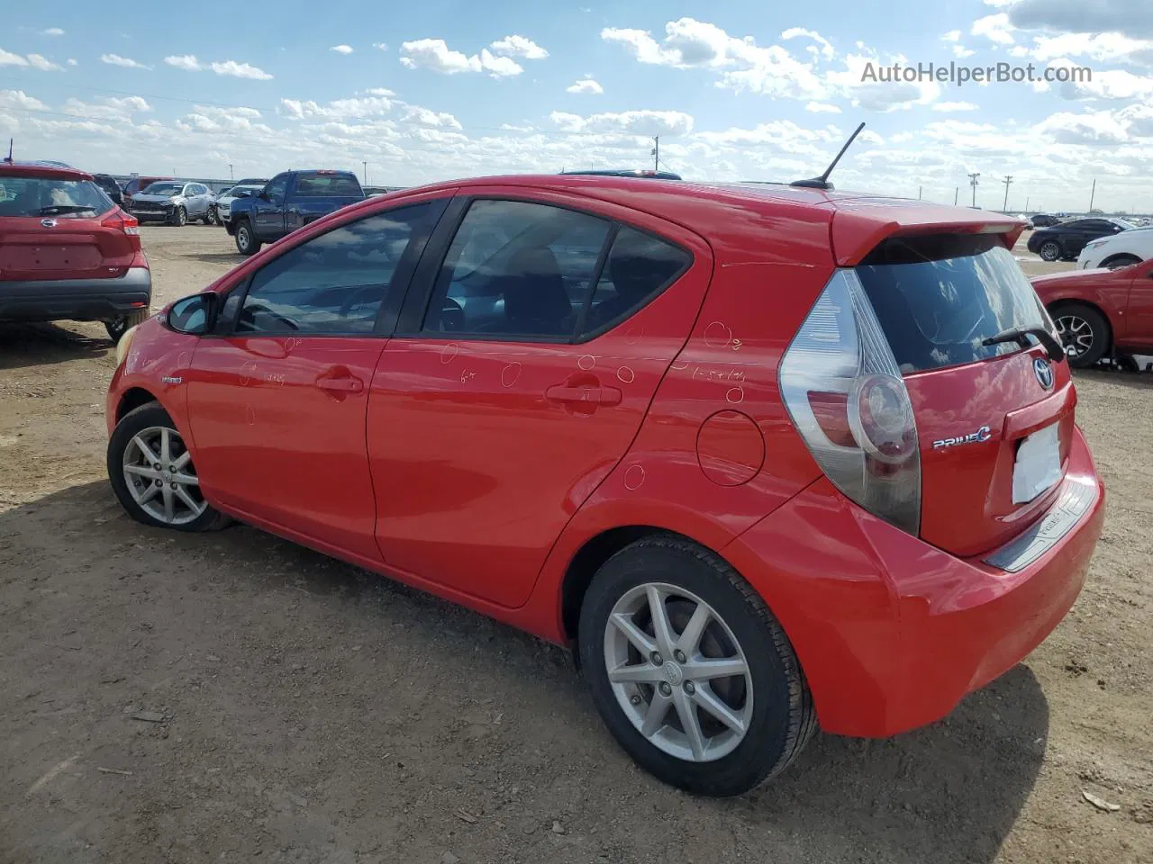 2012 Toyota Prius C  Red vin: JTDKDTB3XC1525927