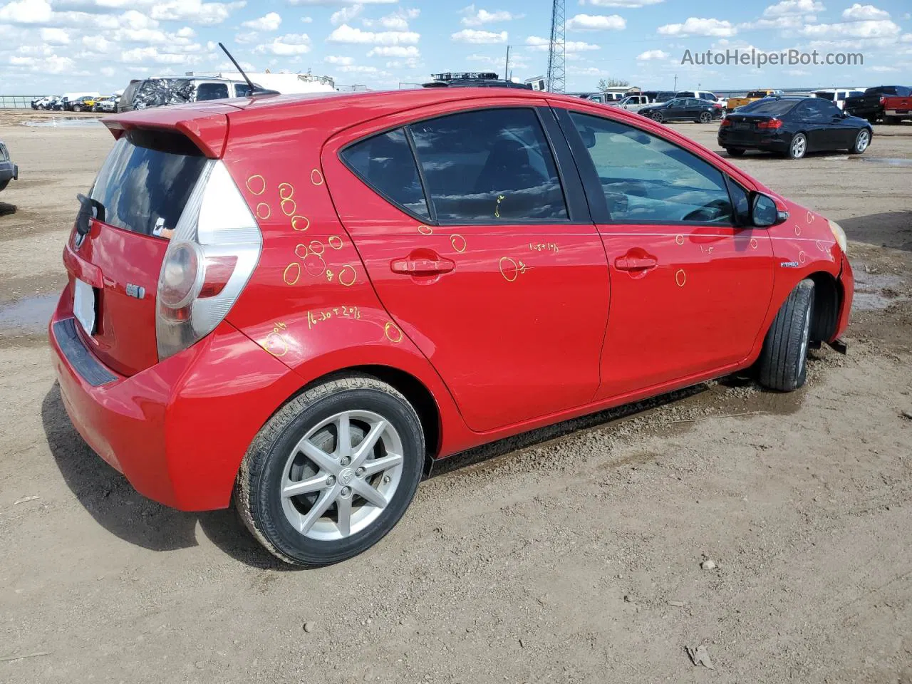 2012 Toyota Prius C  Red vin: JTDKDTB3XC1525927