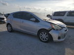 2013 Toyota Prius C  Серебряный vin: JTDKDTB3XD1543149