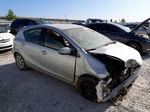 2014 Toyota Prius C  Серебряный vin: JTDKDTB3XE1076171