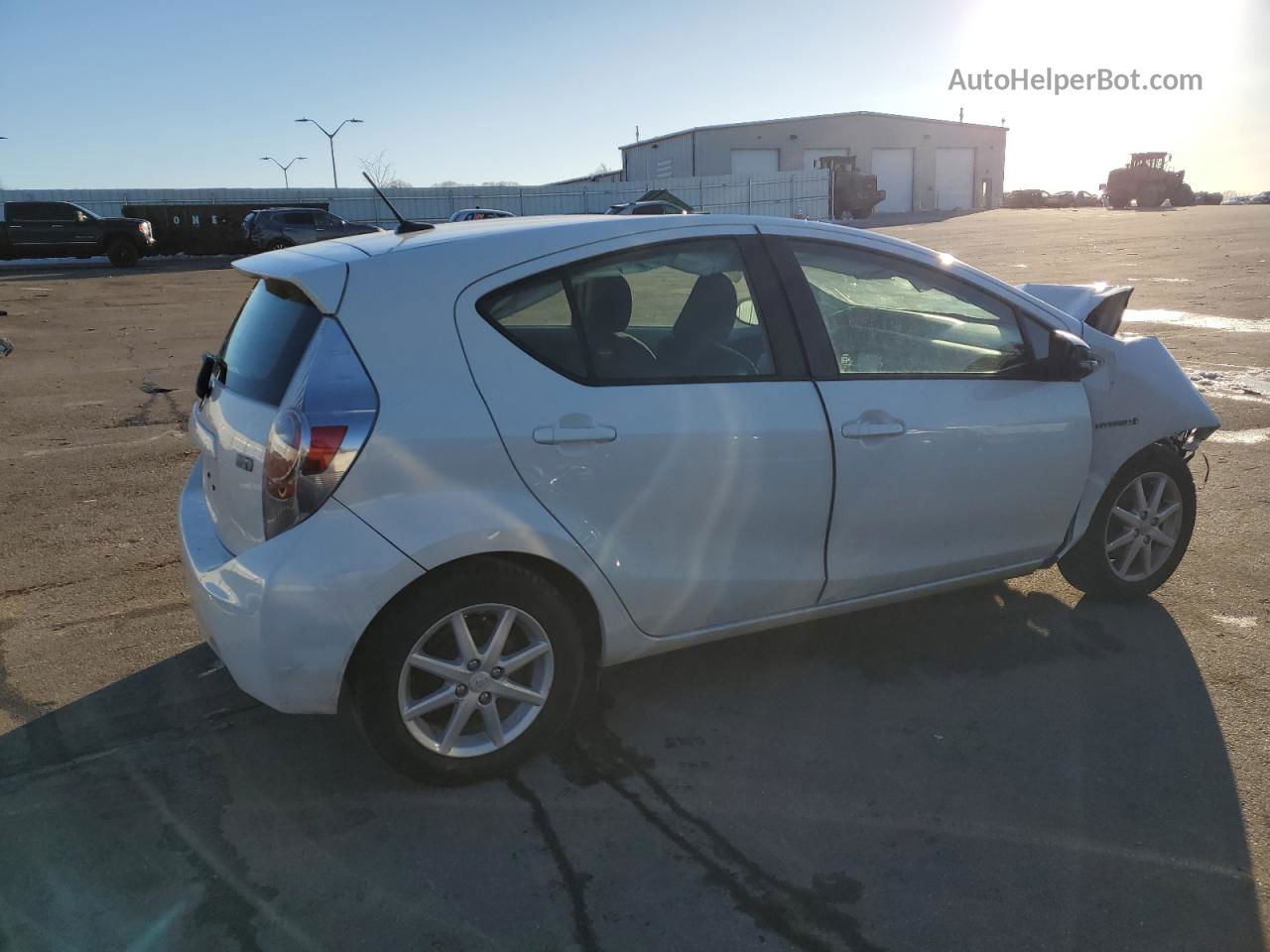 2014 Toyota Prius C  White vin: JTDKDTB3XE1079362