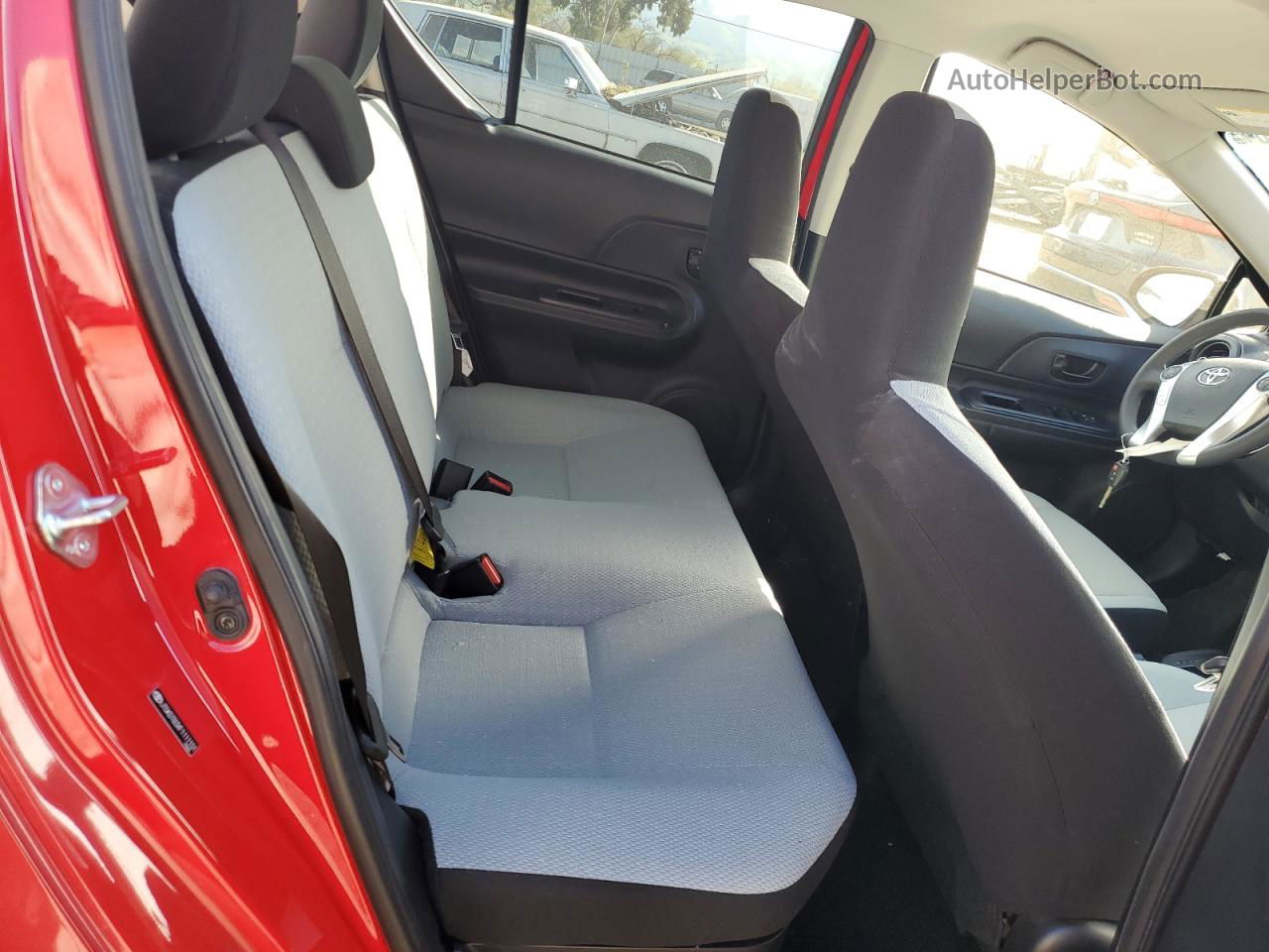 2015 Toyota Prius C  Red vin: JTDKDTB3XF1111101