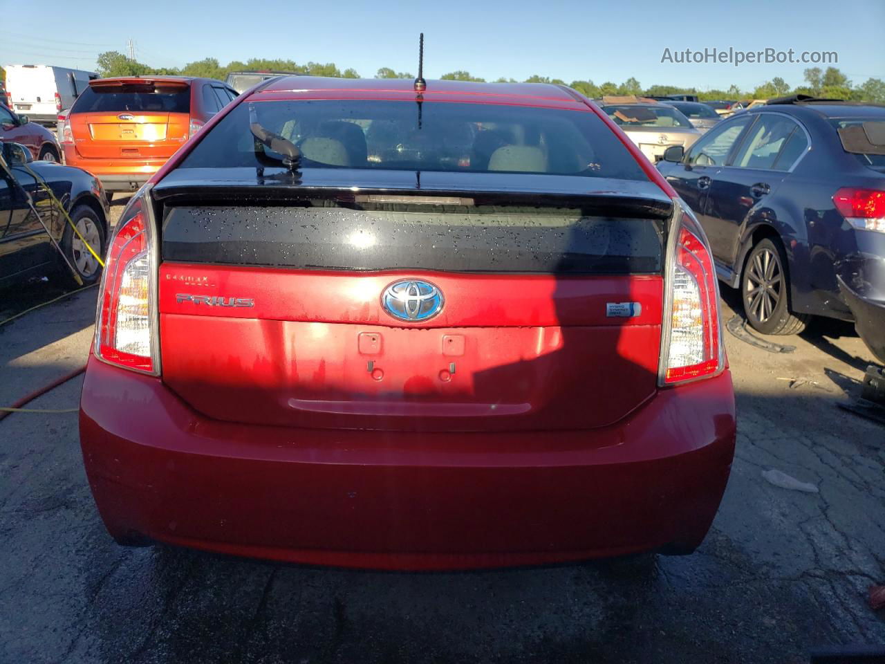 2014 Toyota Prius  Red vin: JTDKN3DU6E1765174