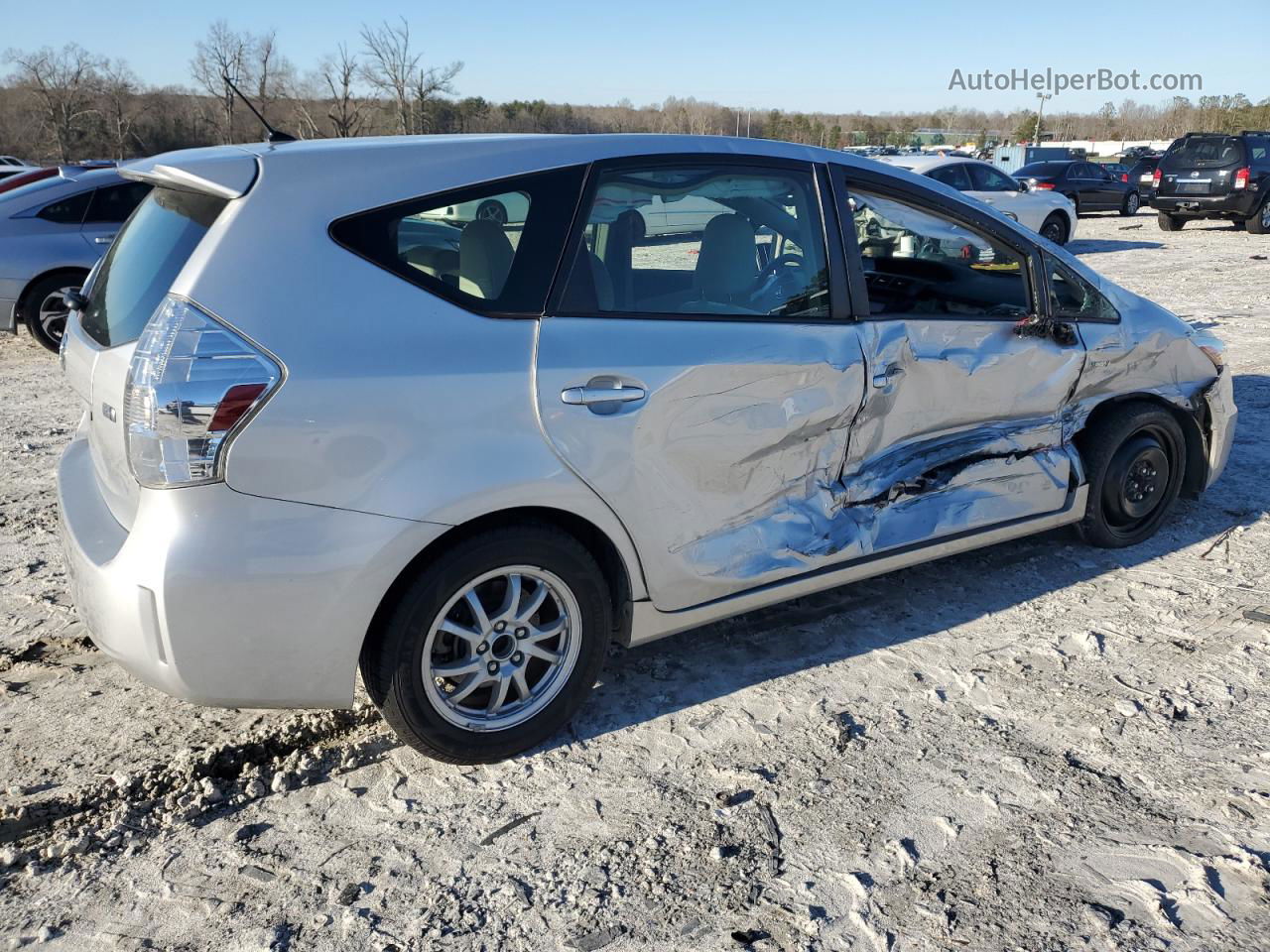 2014 Toyota Prius V  Серебряный vin: JTDZN3EU6E3357906