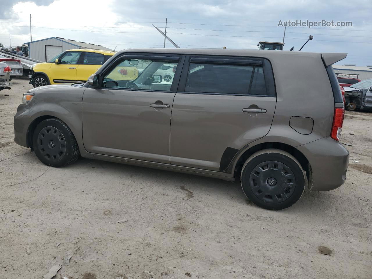 2015 Toyota Scion Xb  Tan vin: JTLZE4FE8FJ077693