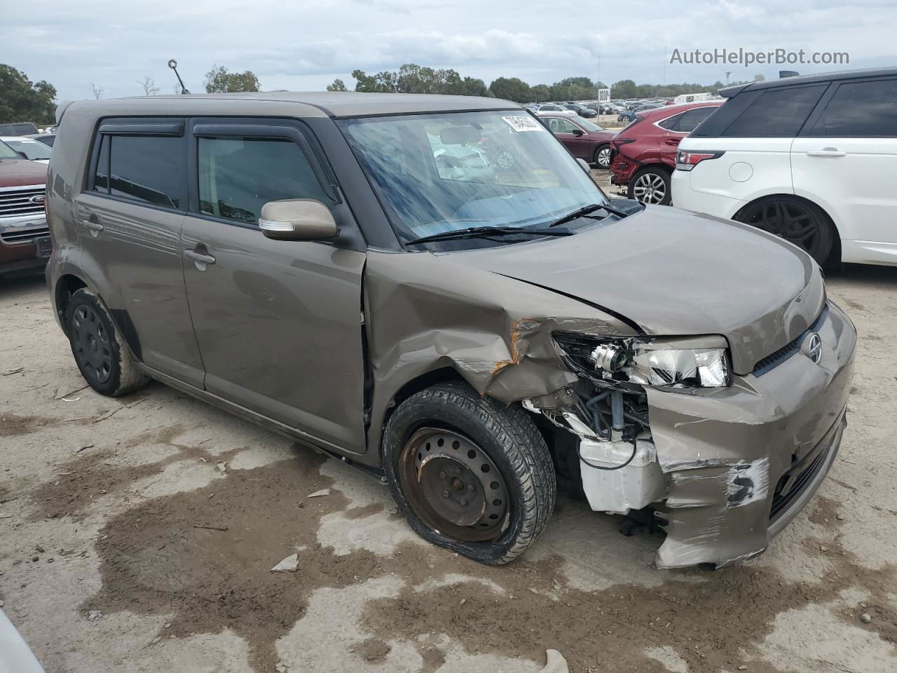 2015 Toyota Scion Xb  Tan vin: JTLZE4FE8FJ077693