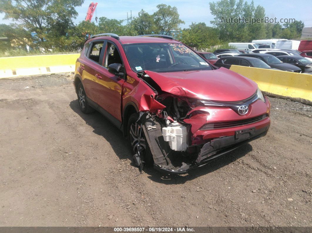 2016 Toyota Rav4 Le Red vin: JTMBFREV1GJ097584