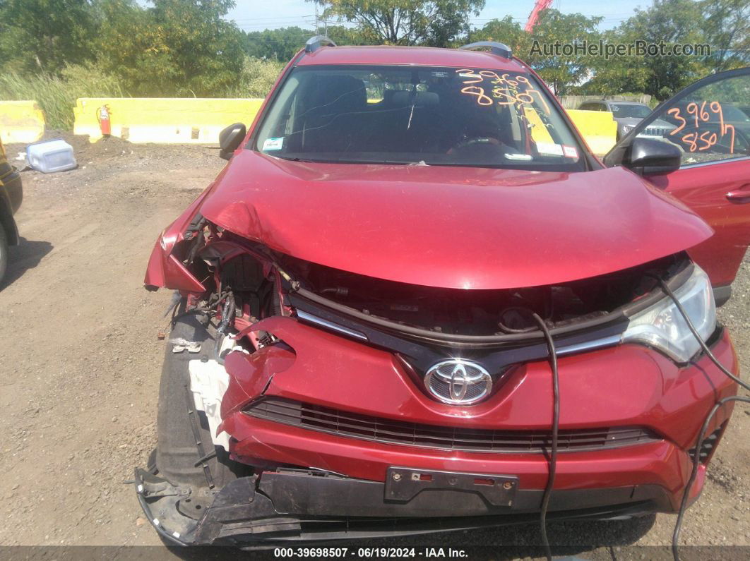 2016 Toyota Rav4 Le Red vin: JTMBFREV1GJ097584