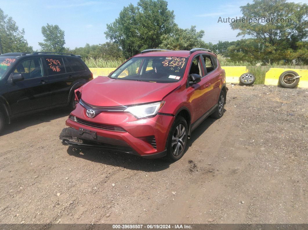 2016 Toyota Rav4 Le Red vin: JTMBFREV1GJ097584