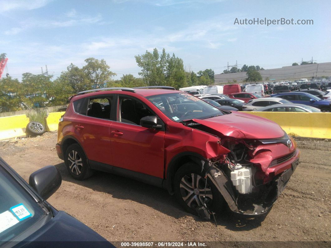 2016 Toyota Rav4 Le Red vin: JTMBFREV1GJ097584