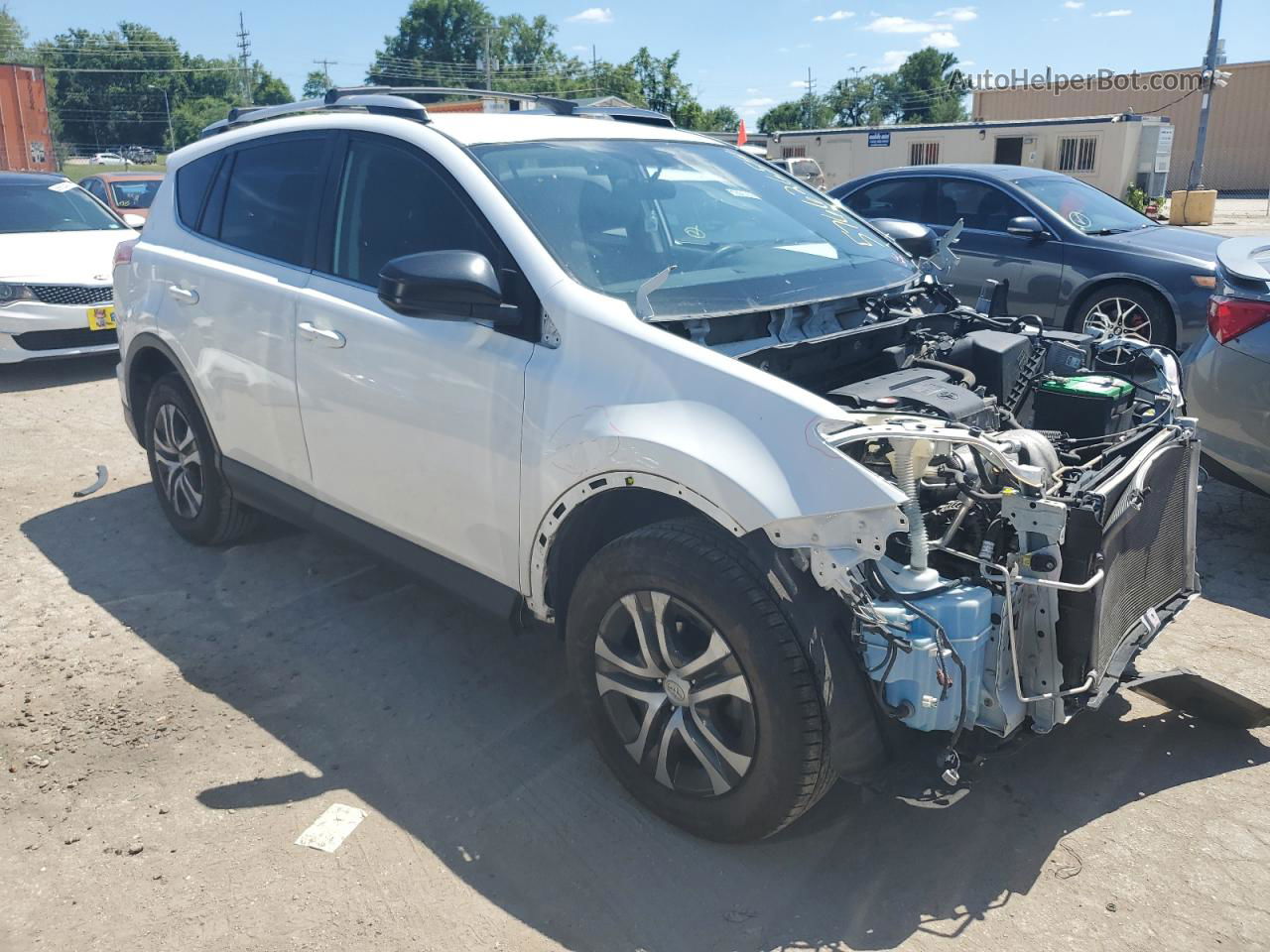 2016 Toyota Rav4 Le White vin: JTMBFREV2GJ055554