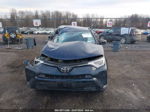 2018 Toyota Rav4 Le Black vin: JTMBFREV2JJ728785