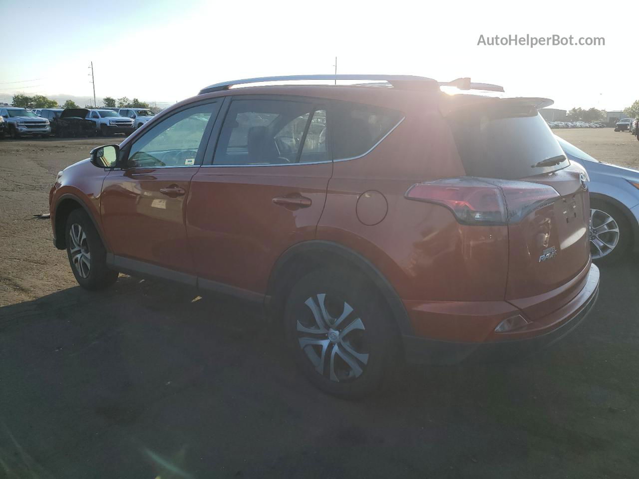 2016 Toyota Rav4 Le Orange vin: JTMBFREV6GJ057050