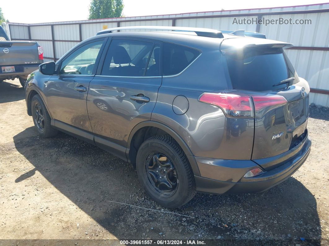 2018 Toyota Rav4 Le Gray vin: JTMBFREV6JJ184517