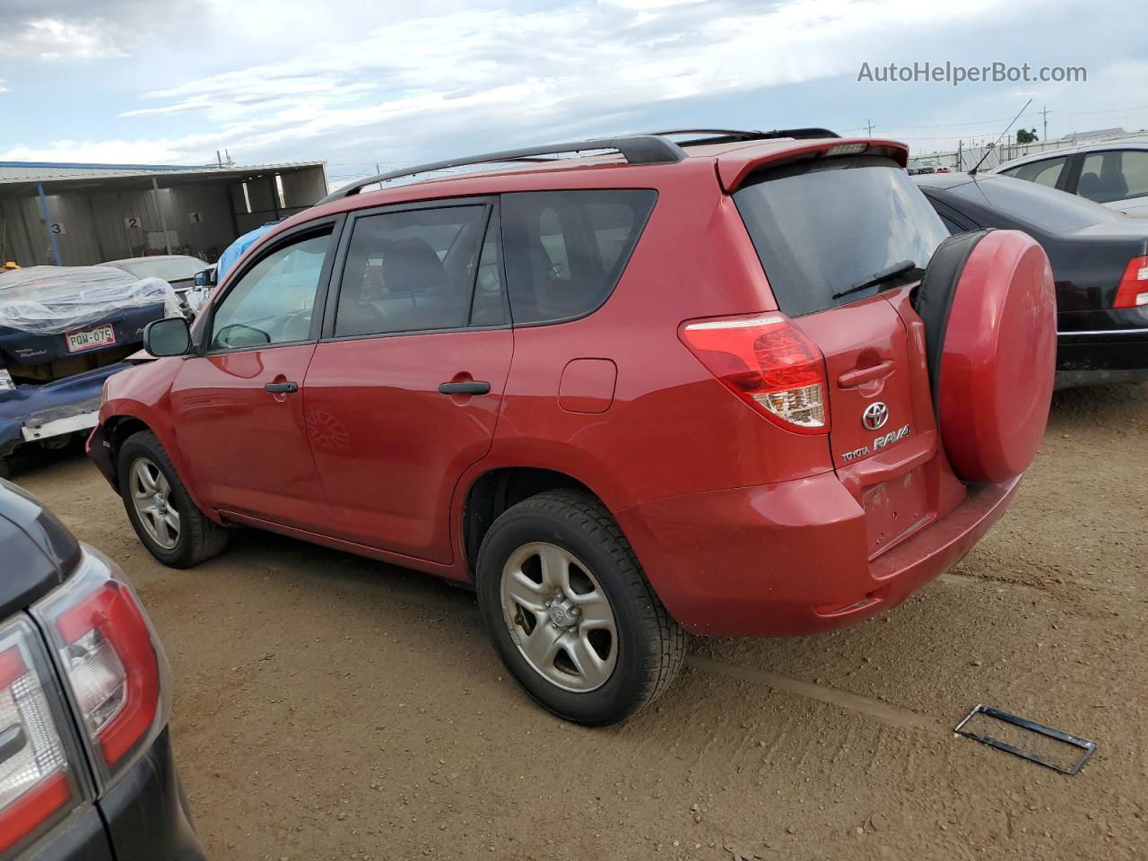 2007 Toyota Rav4  Red vin: JTMBK33V776027795