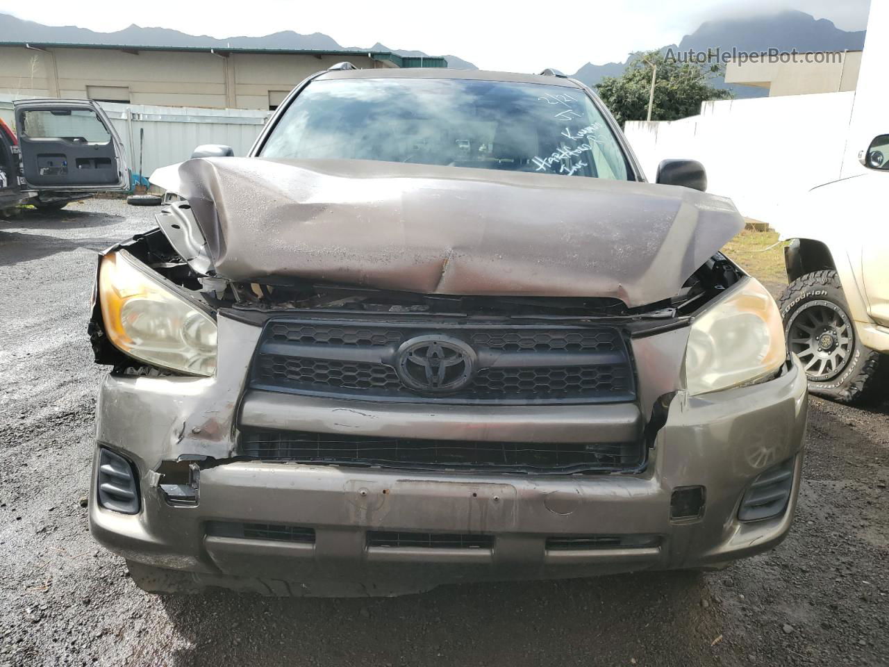 2010 Toyota Rav4  Коричневый vin: JTMKF4DV9A5021258