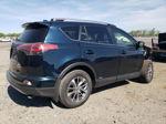 2018 Toyota Rav4 Hv Le Blue vin: JTMRJREV4JD243107