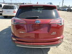 2018 Toyota Rav4 Hv Le Red vin: JTMRJREV5JD181345