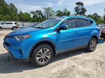 2018 Toyota Rav4 Hv Le Blue vin: JTMRJREV5JD251068