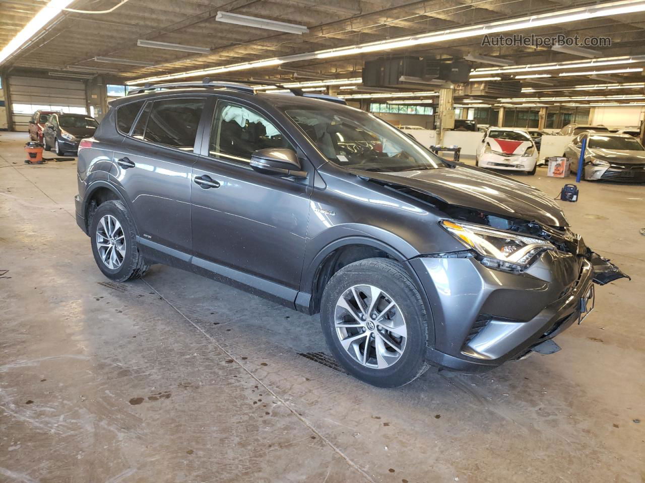 2018 Toyota Rav4 Hv Le Gray vin: JTMRJREV6JD229905