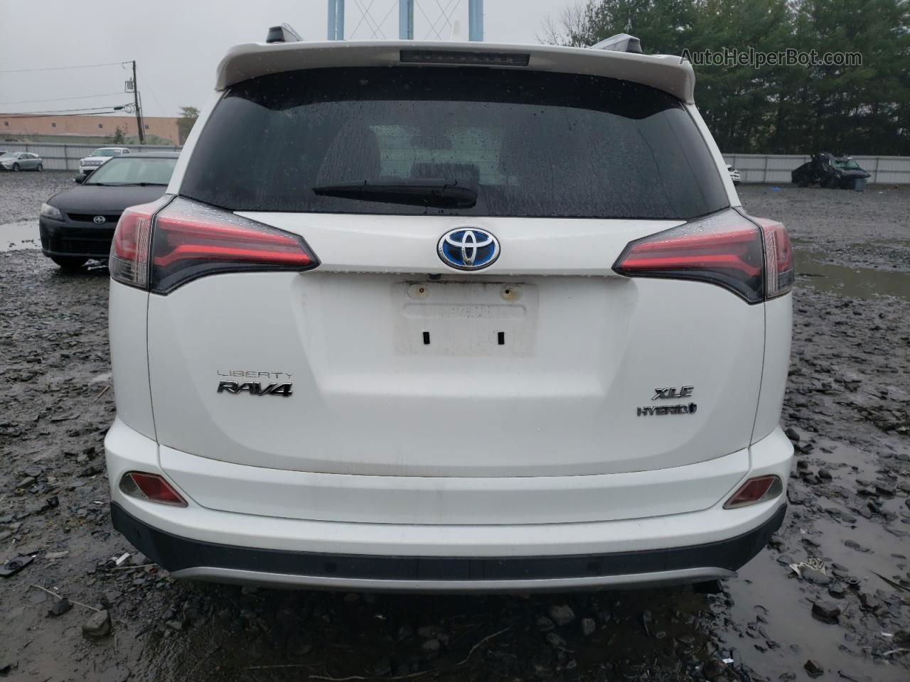 2016 Toyota Rav4 Hv Xle White vin: JTMRJREV8GD054811