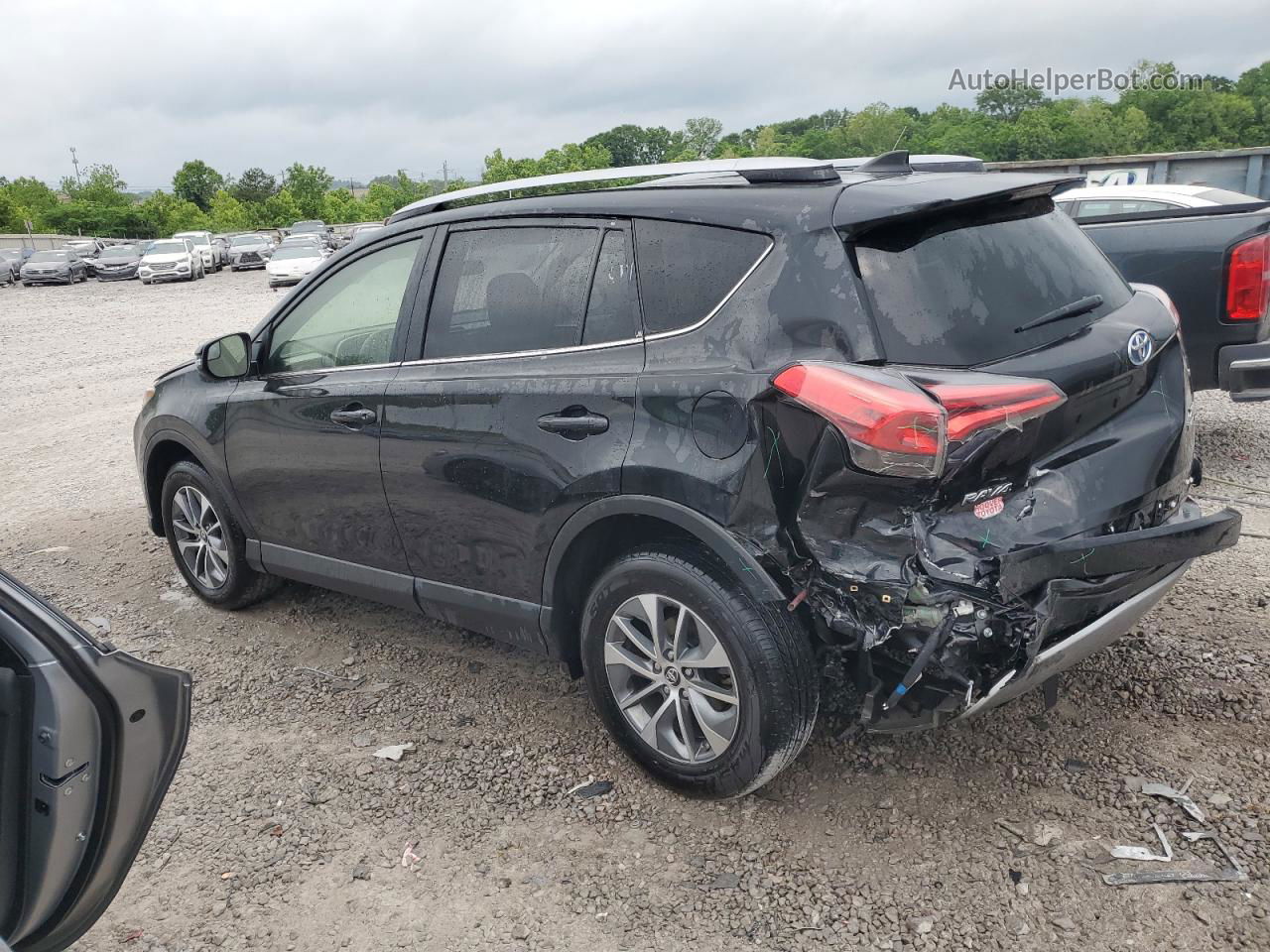 2018 Toyota Rav4 Hv Le Black vin: JTMRJREV9JD164242