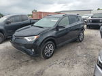 2018 Toyota Rav4 Hv Le Black vin: JTMRJREV9JD164242