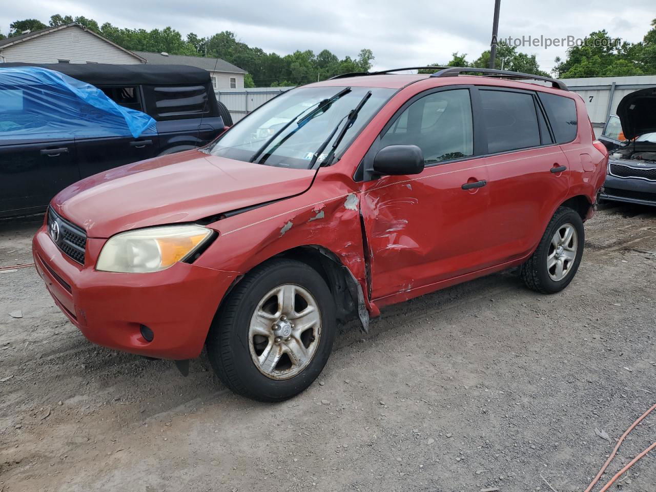 2007 Toyota Rav4  Red vin: JTMZD33V776050096