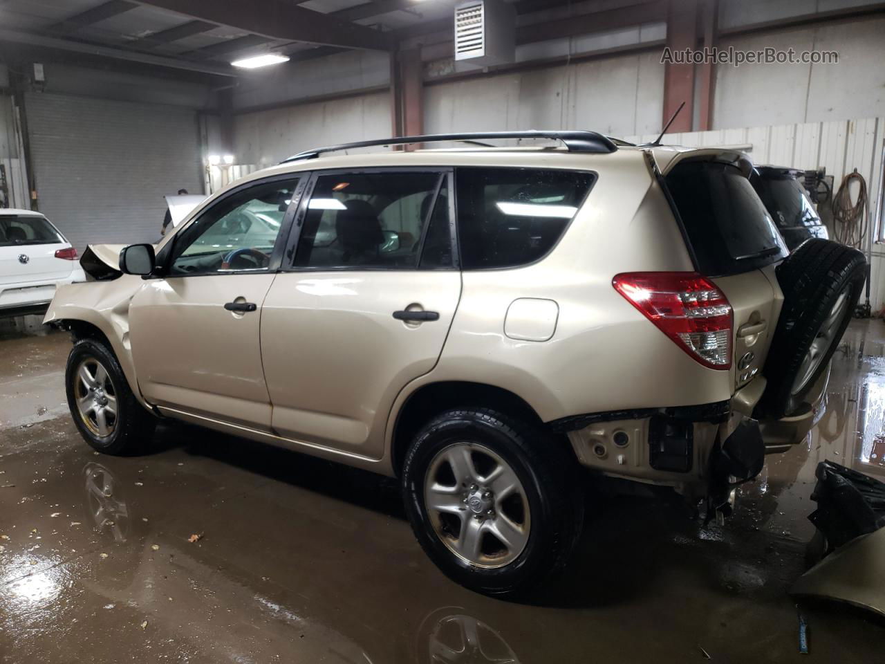 2010 Toyota Rav4  Tan vin: JTMZF4DV9AD029316