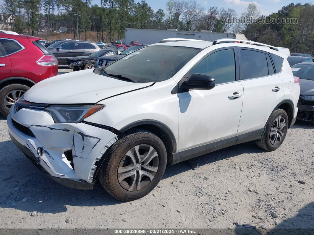 2016 Toyota Rav4 Le Белый vin: JTMZFREV3GD090407