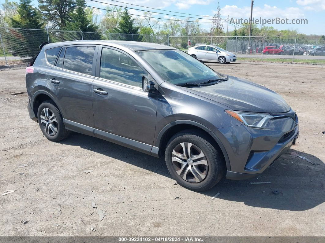 2018 Toyota Rav4 Le Gray vin: JTMZFREV3JJ722489