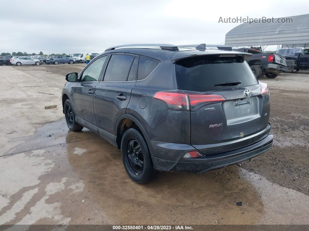 2018 Toyota Rav4 Le Gray vin: JTMZFREV7JD130348