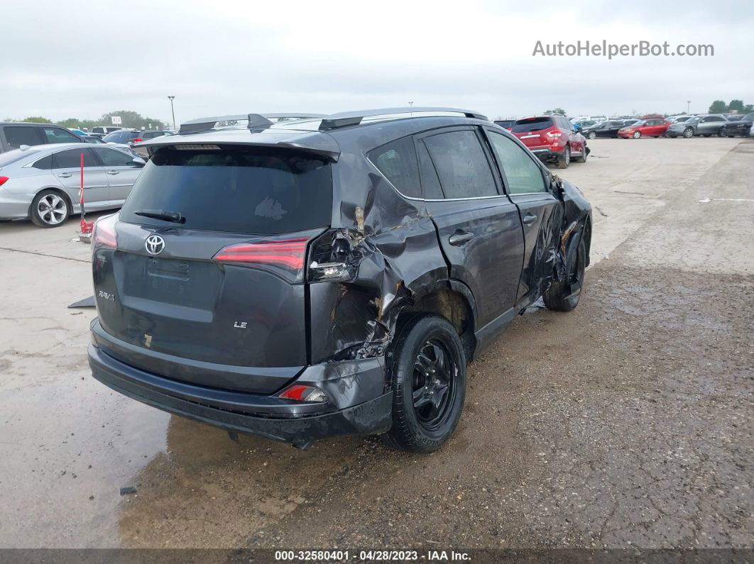 2018 Toyota Rav4 Le Gray vin: JTMZFREV7JD130348