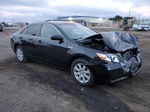 2009 Toyota Camry Hybrid Черный vin: JTNBB46K493049227