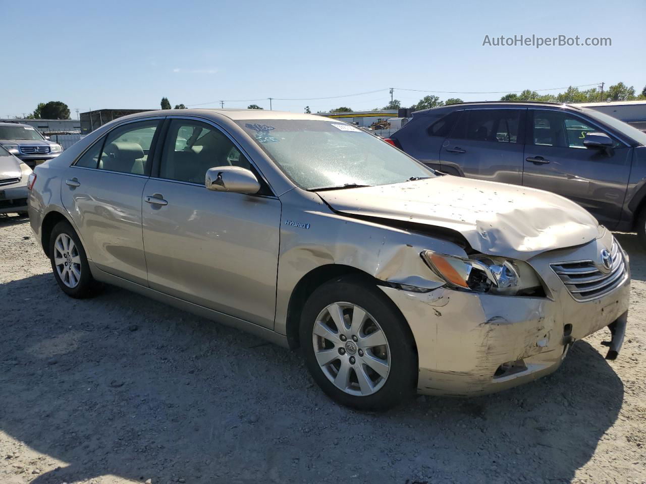 2007 Toyota Camry Hybrid Gold vin: JTNBB46K873005499