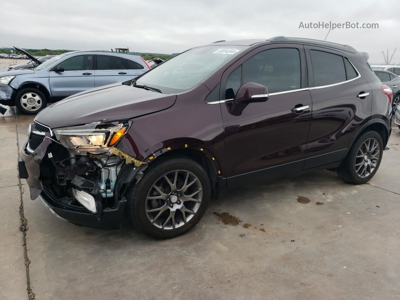 2018 Buick Encore Sport Touring Burgundy vin: KL4CJ1SB4JB679401