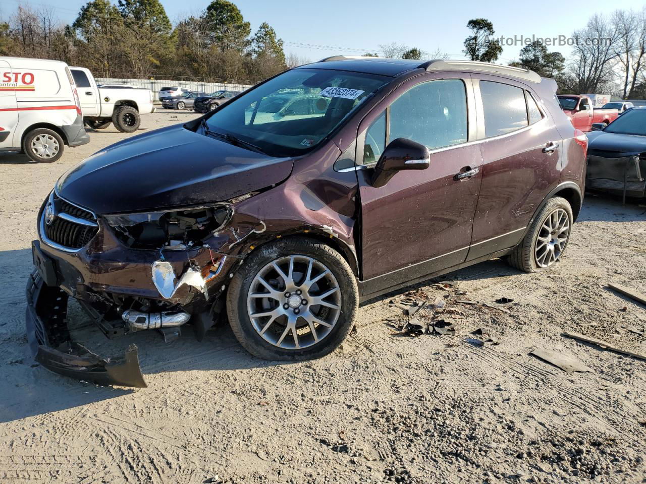 2018 Buick Encore Sport Touring Burgundy vin: KL4CJ1SM0JB658370