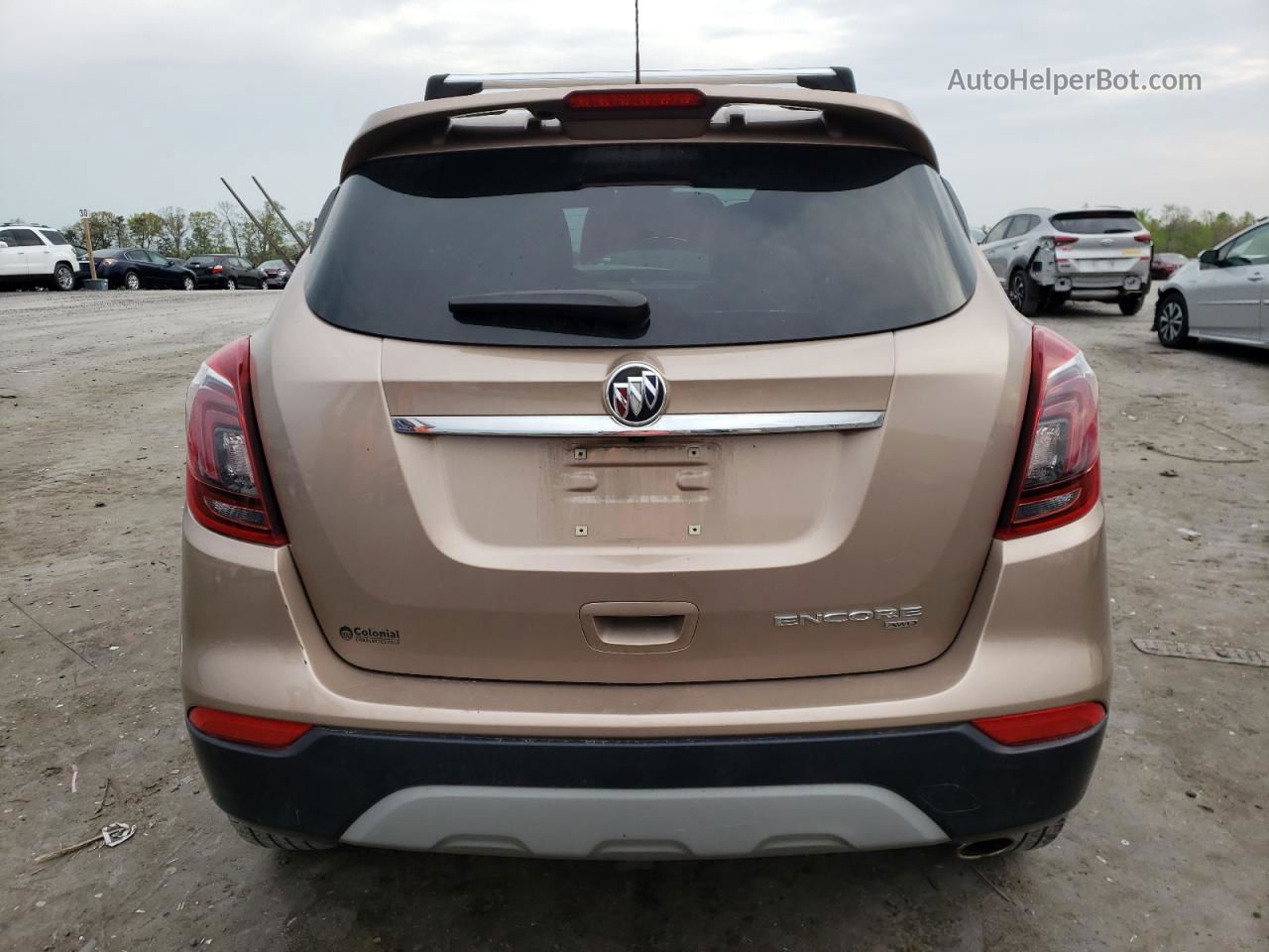 2019 Buick Encore Sport Touring Tan vin: KL4CJ2SB5KB760401