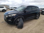 2016 Hyundai Tucson Limited Черный vin: KM8J33A20GU214398