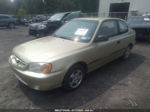 2001 Hyundai Accent L Золотой vin: KMHCF35G11U117644