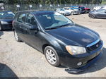 2005 Kia Spectra   Black vin: KNAFE161055076617