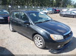 2005 Kia Spectra   Black vin: KNAFE161055076617