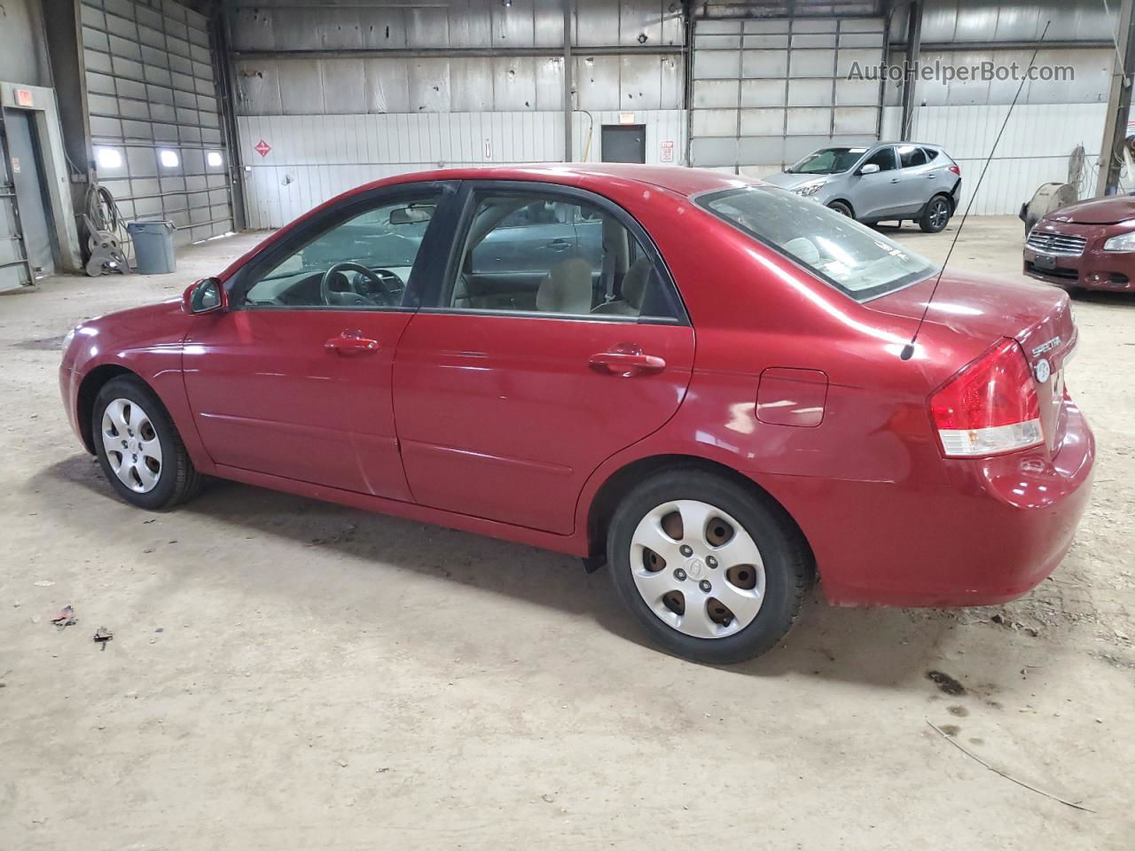 2009 Kia Spectra Ex Maroon vin: KNAFE221395659197