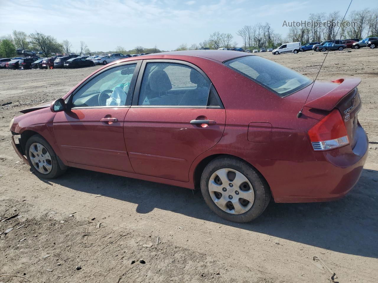 2009 Kia Spectra Ex Burgundy vin: KNAFE221595619851