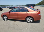 2009 Kia Spectra Ex Orange vin: KNAFE222295027350