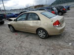 2009 Kia Spectra Ex Tan vin: KNAFE222X95660954