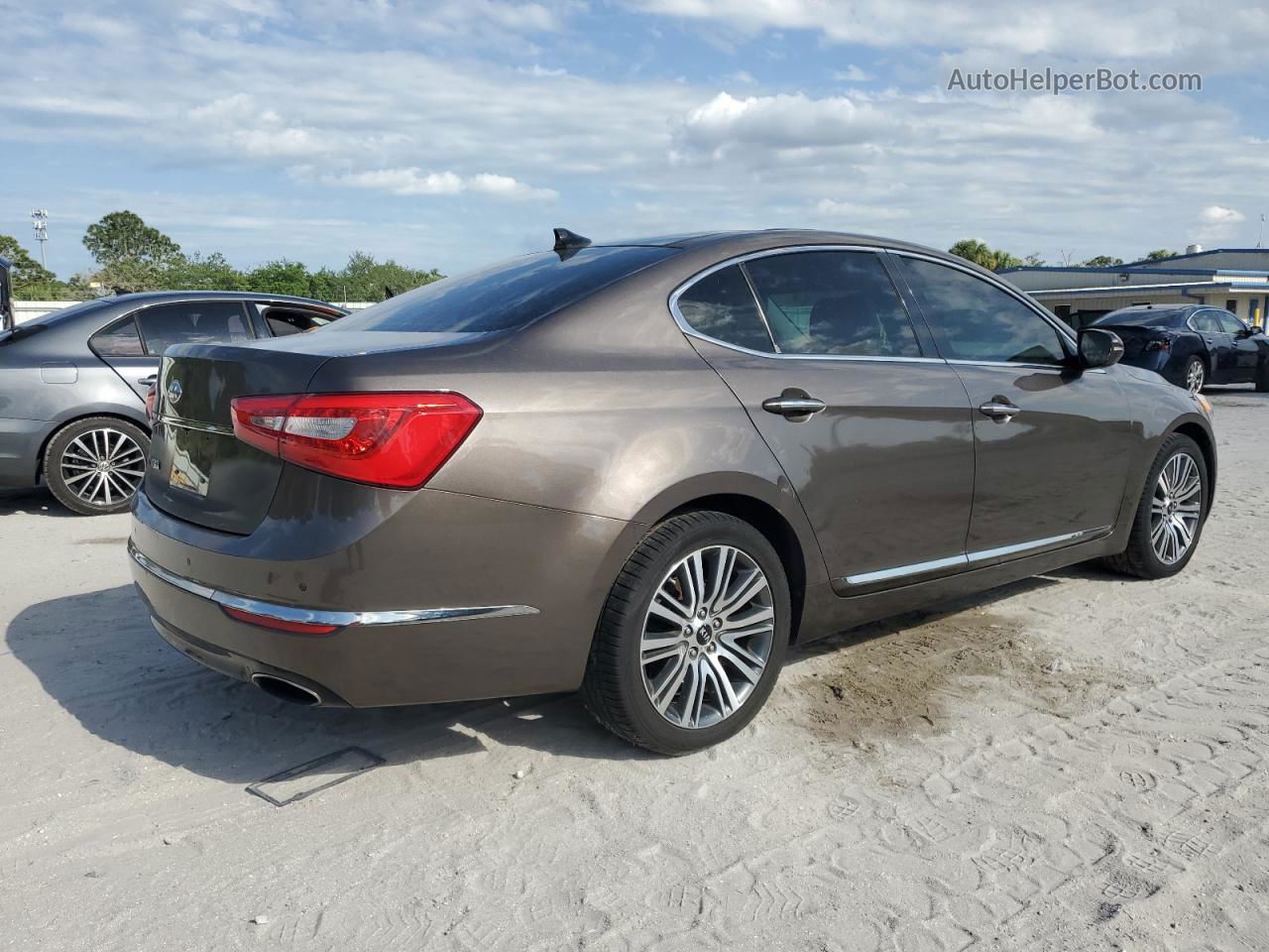 2014 Kia Cadenza Premium Коричневый vin: KNALN4D73E5163813